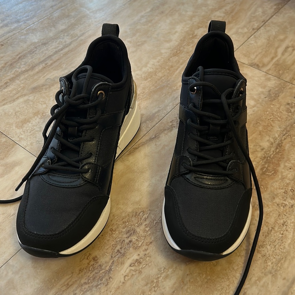 NWOT black wedge sneaker.